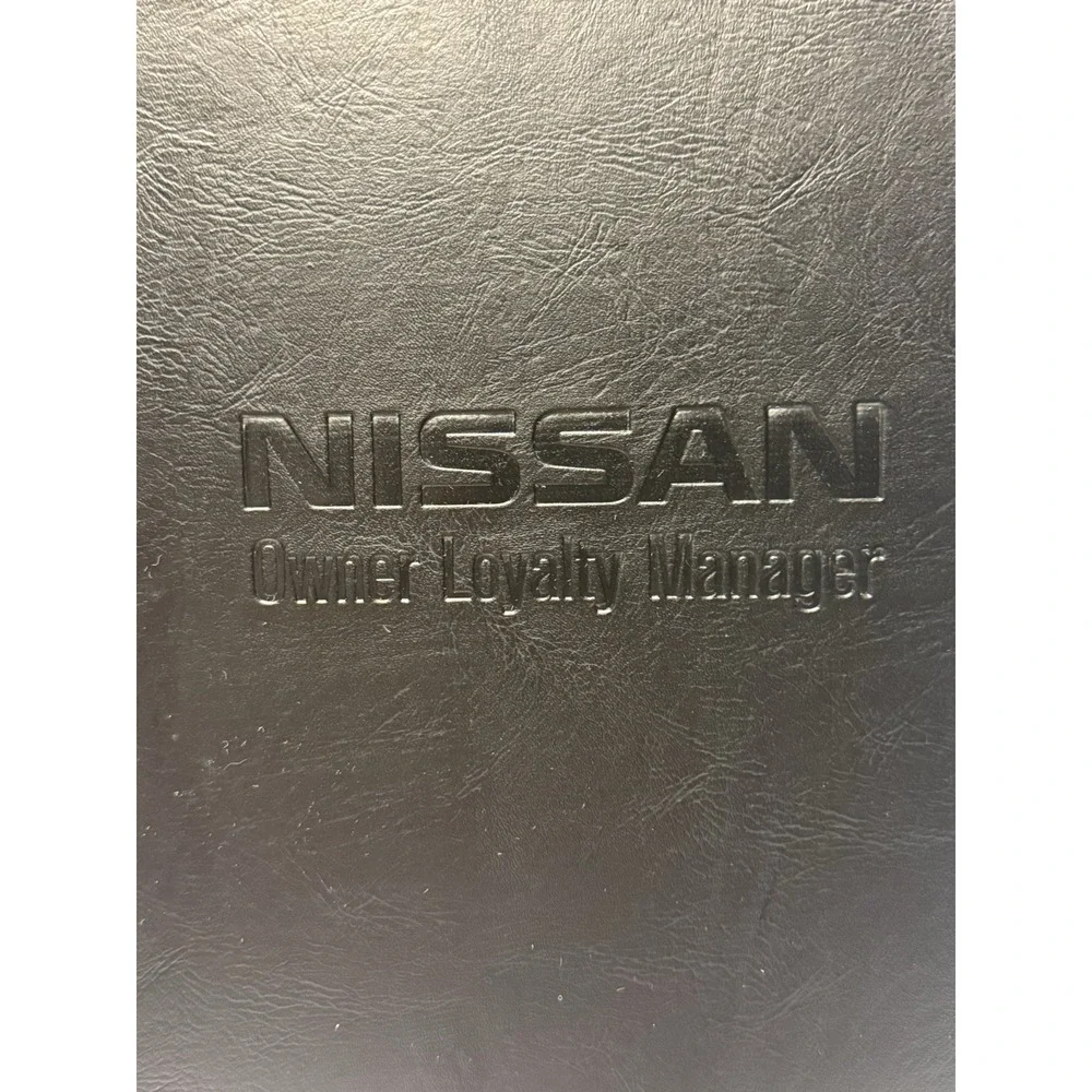 Nissan Owner Loyalty Manager faux-leather portfolio/3 ring binder 10x13
